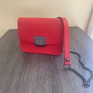 Red genuine leather chain bag. Shoulder/crossbody. New without tags.